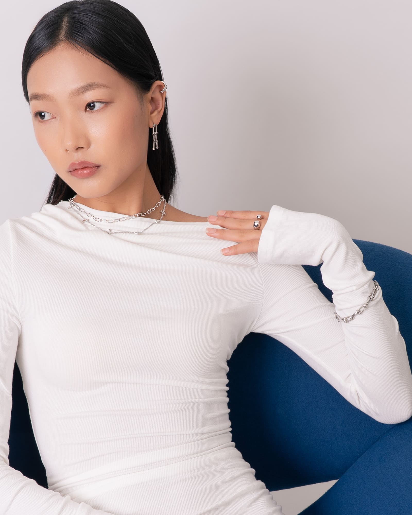 Melt silver open ring by Lavana on model with modern polished molten dome ends