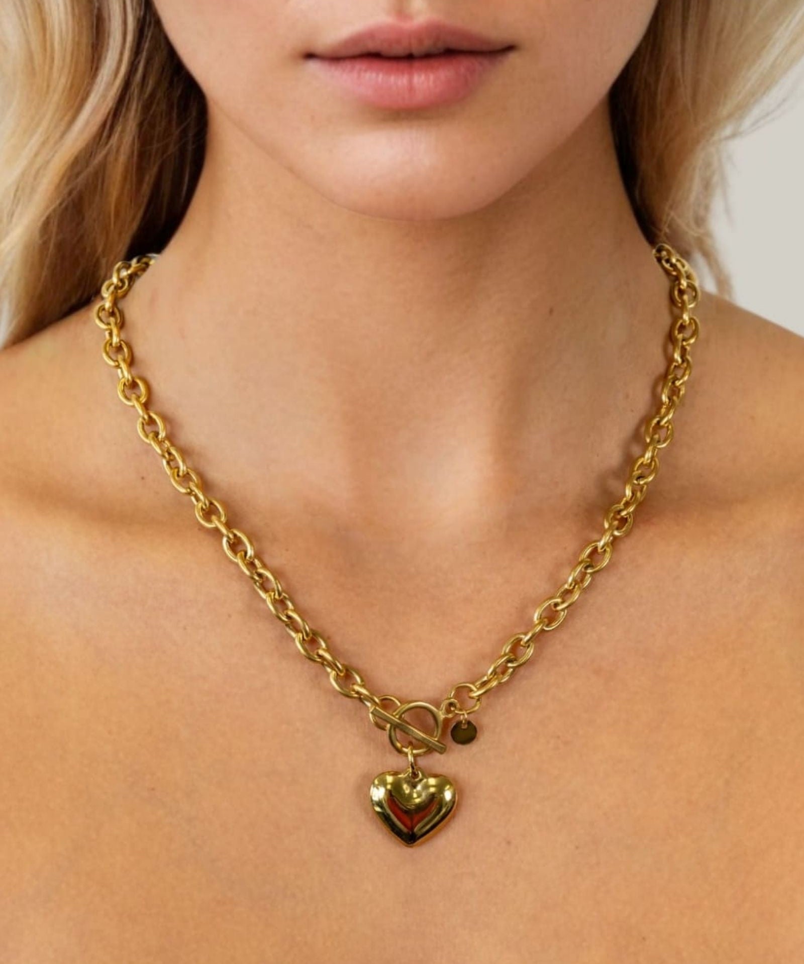 Mod Heart Gold Chain Necklace by Lavana, on model; chunky rolo chain with polished heart charm