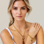 Mod Heart Gold Necklace by Lavana, on model; chunky rolo chain with heart charm Heart Tag T-bar Bracelet with toggle clasp