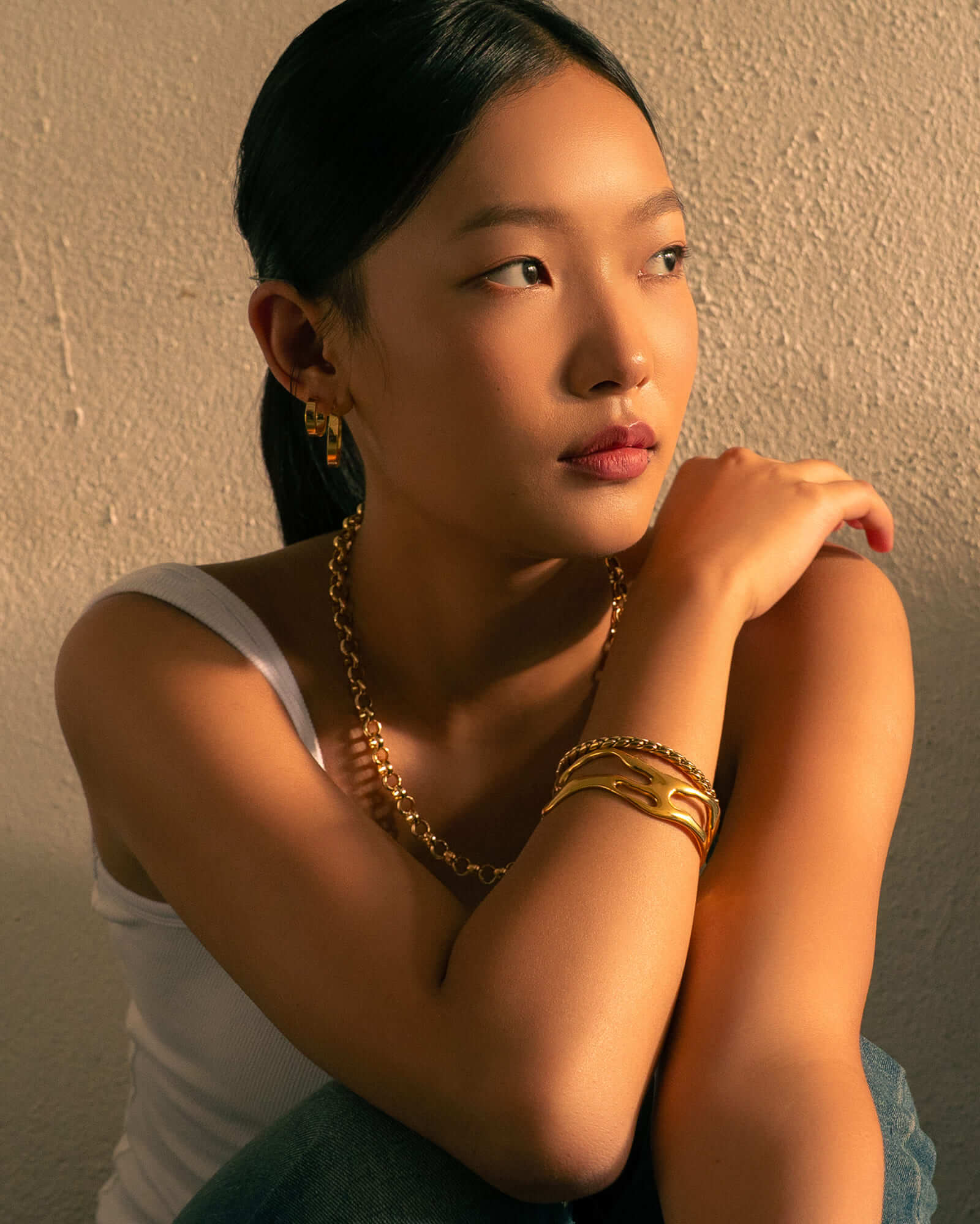 Molten Open Gold Cuff Bracelet by Lavana, on model; modern sculptural openwork silhouette