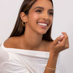 Monte Carlo Gold Diamond Hoop Earrings by Lavana on model in 18k gold vermeil pave sparkling lab grown diamonds