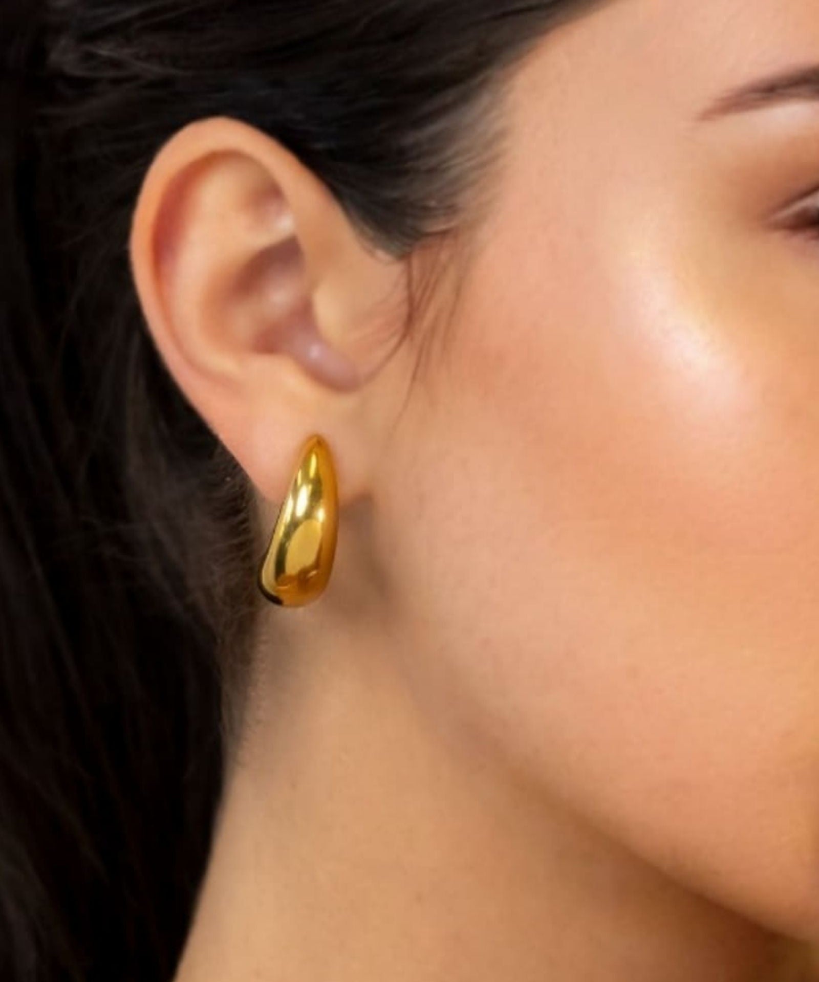 Moonscapes Gold Stud Earrings by LAVANA on model polished chunky crescent dome