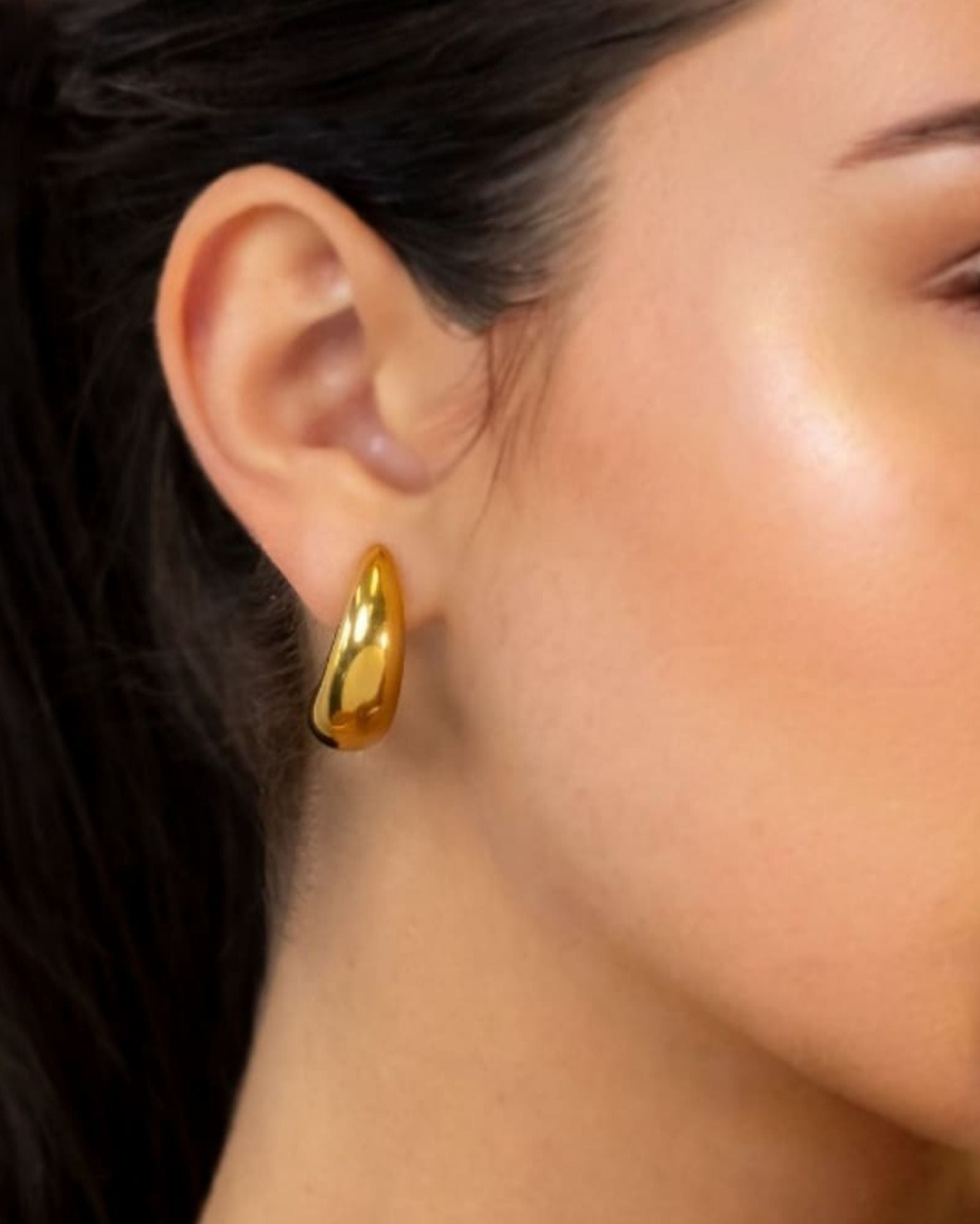 Moonscapes Gold Stud Earrings by LAVANA on model polished chunky crescent dome