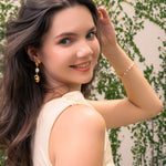 Moontide Gold Pearl Bracelet by Lavana, on model; freshwater pearls polished gold beads and extender chain 