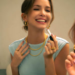 Muse Gold Hoop Earrings by Lavana, on model wide dress hoops with organic twist texture