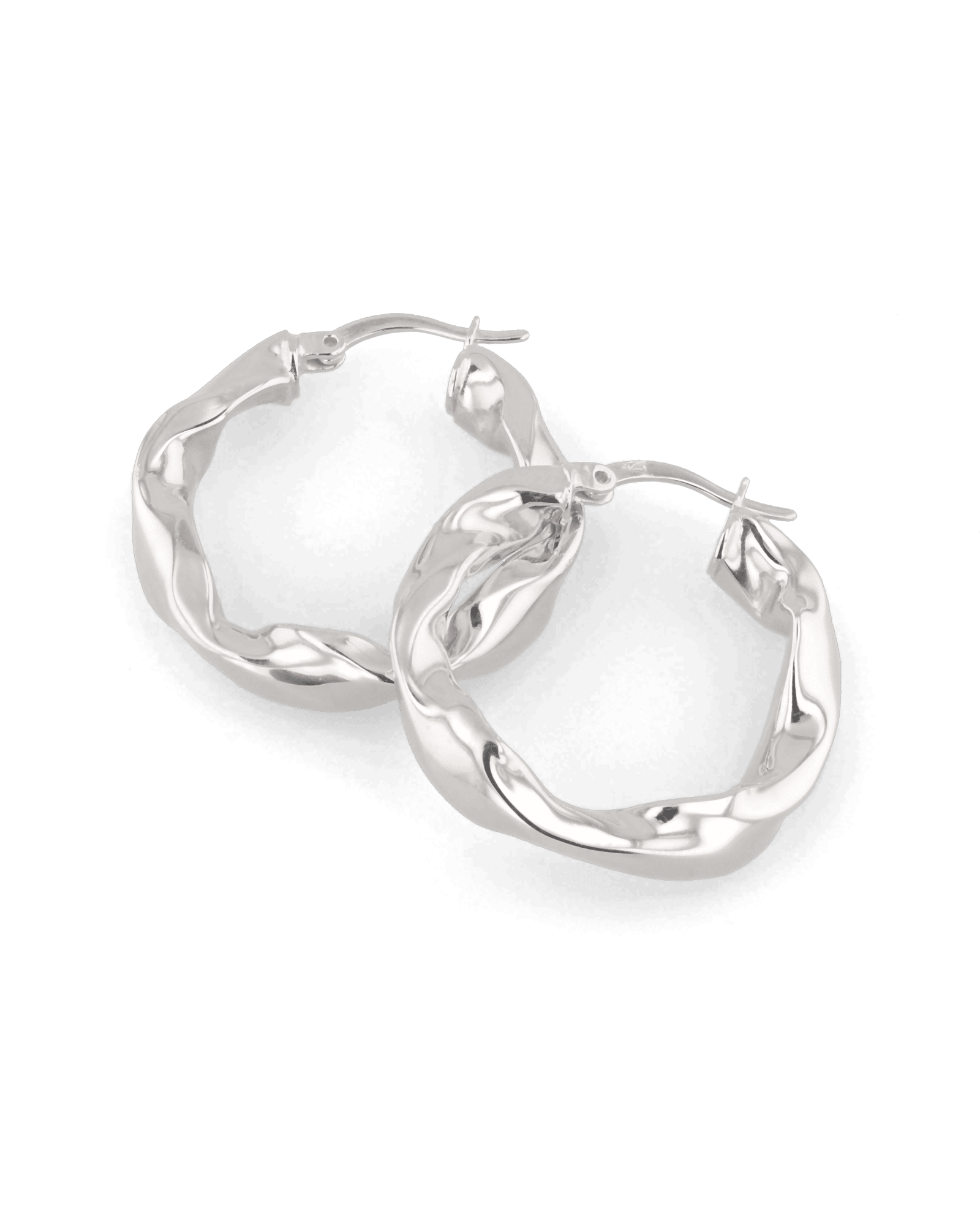 Musica Silver Hoop Earrings by Lavana, round hoops with fluid twist movement and cool gloss