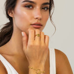 Nexus Gold Link Bracelet by Lavana on model with open ring focal and bead stations A