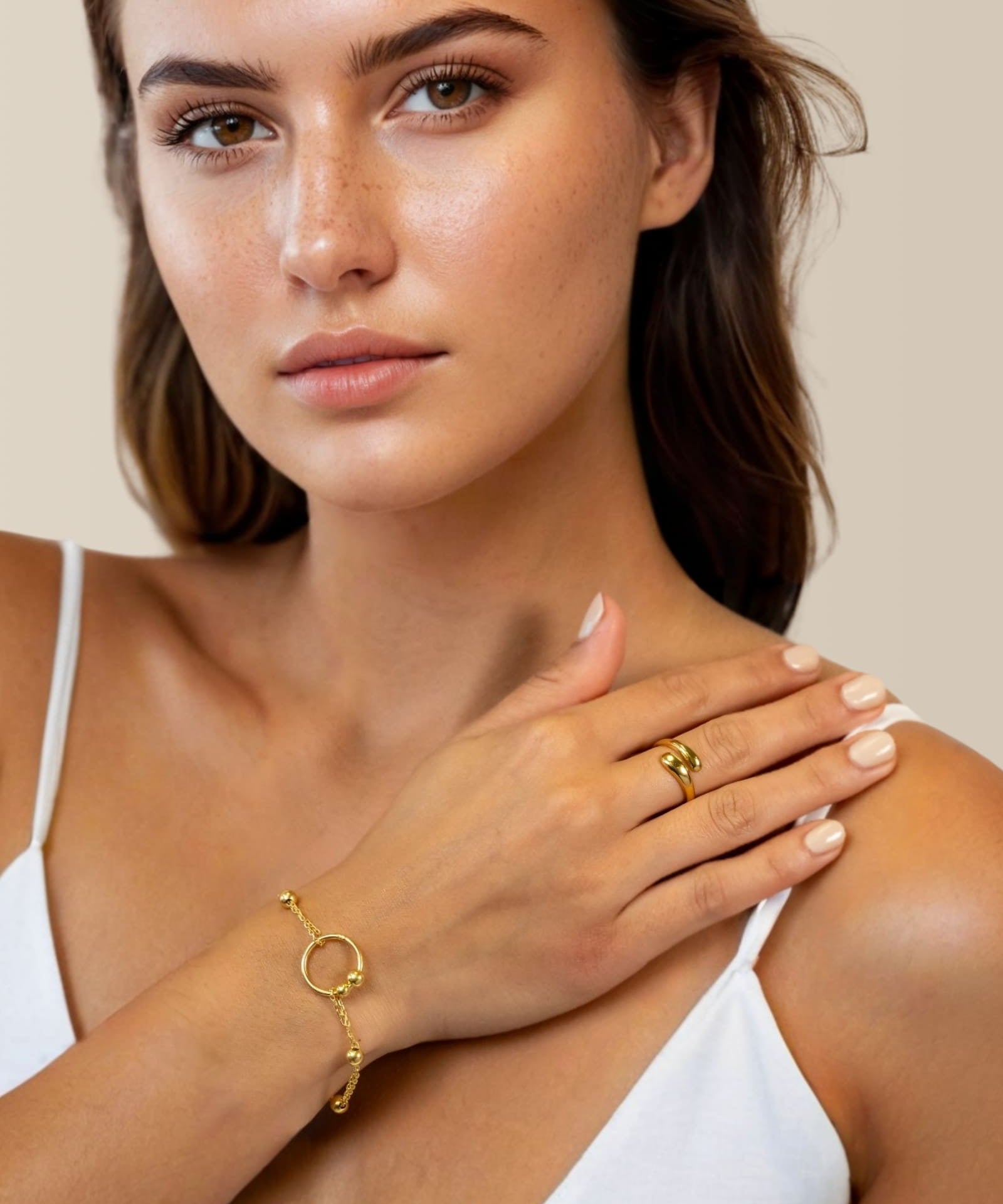 Nexus Gold Link Bracelet by Lavana on model with open ring focal and bead stations A