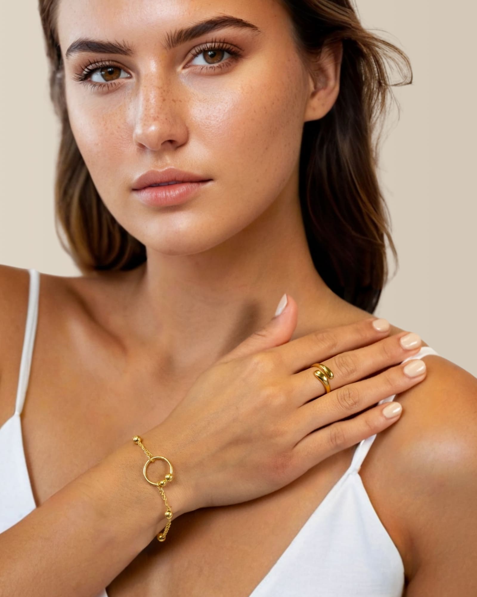 Nexus Gold Link Bracelet by Lavana on model with open ring focal and bead stations A