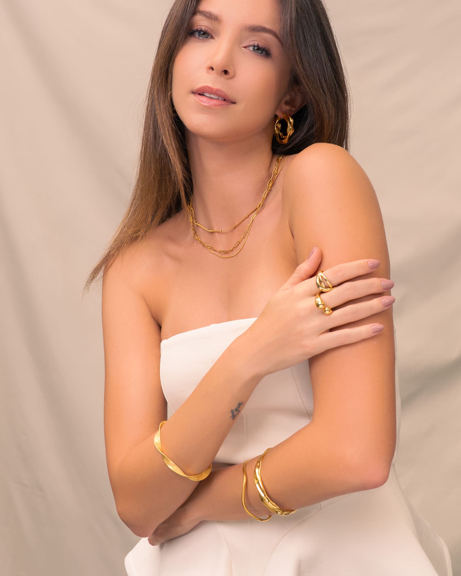 Ocean Whispers Gold Cuff Bracelet by Lavana, on model; modern sculpted wave profile 
