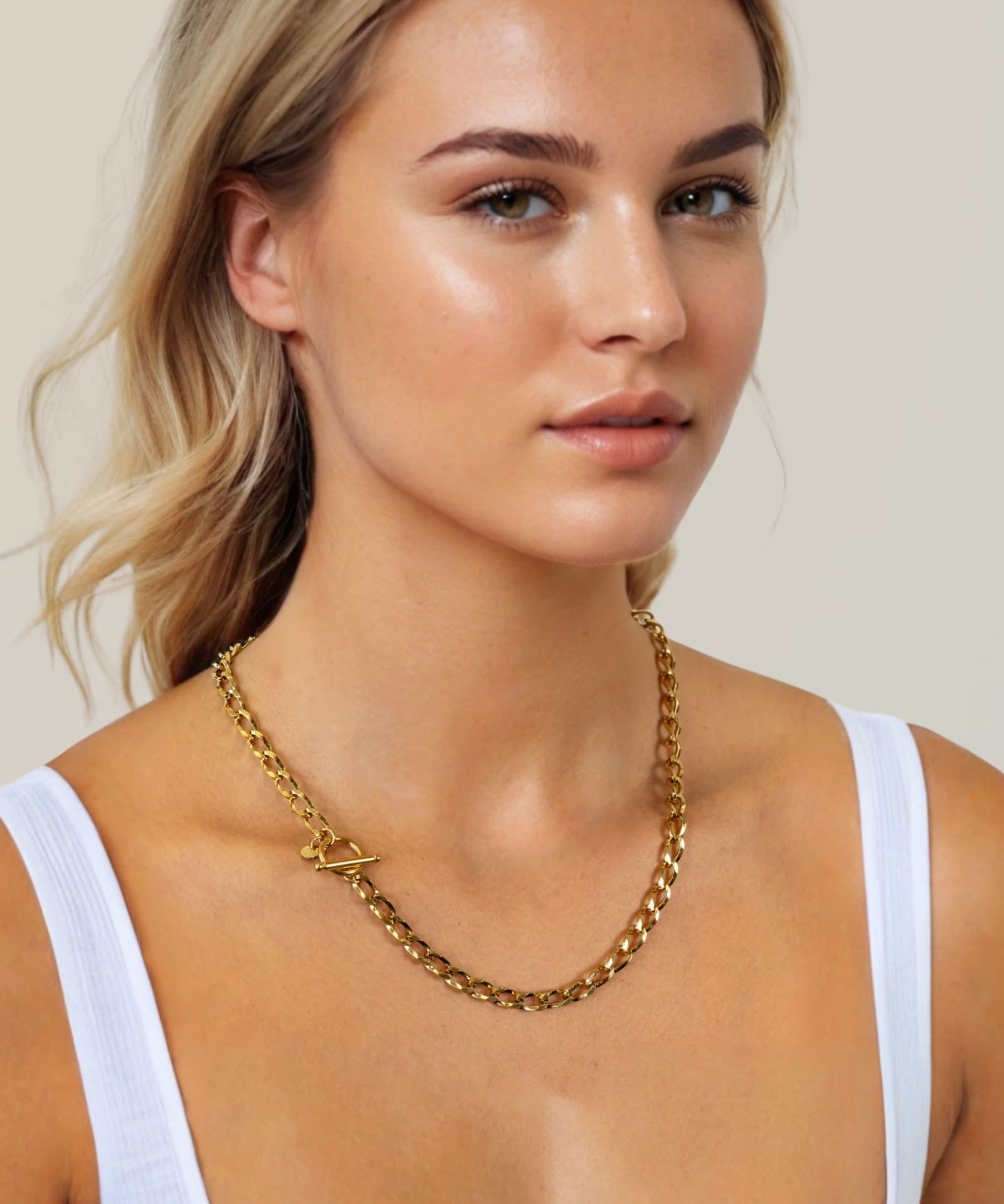 Off Duty T-Bar Gold Chain Necklace by Lavana, on model; chunky link chain with front T-bar toggle