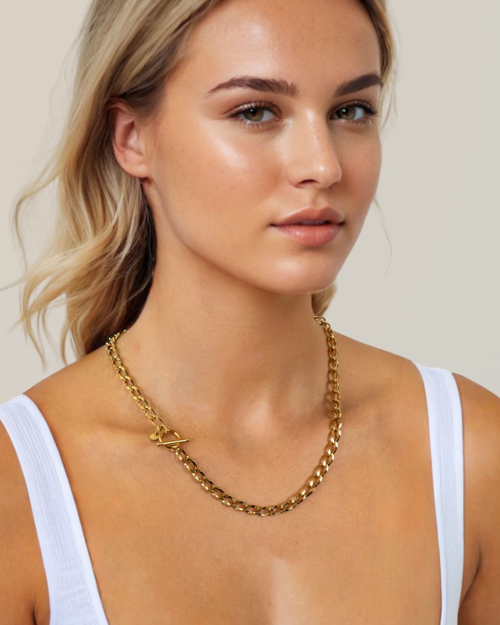Off Duty T-Bar Gold Chain Necklace by Lavana, on model; chunky link chain with front T-bar toggle