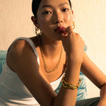 Off Duty T-Bar Gold Chain Necklace by Lavana, on model; modern chunky link chain with front T-bar toggle