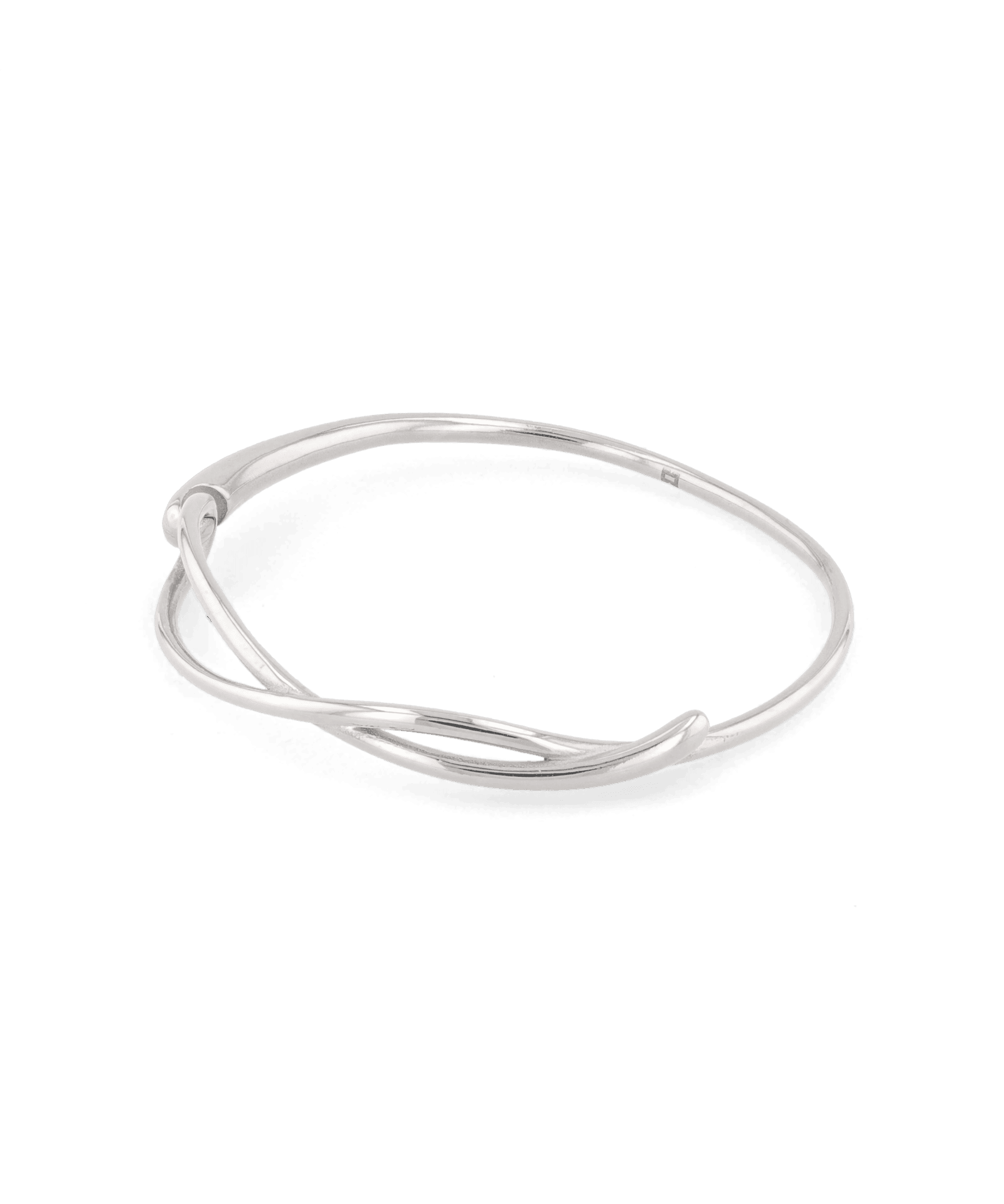 Organic Fluid Silver Bangle with smooth sculptural loop design by Lavana