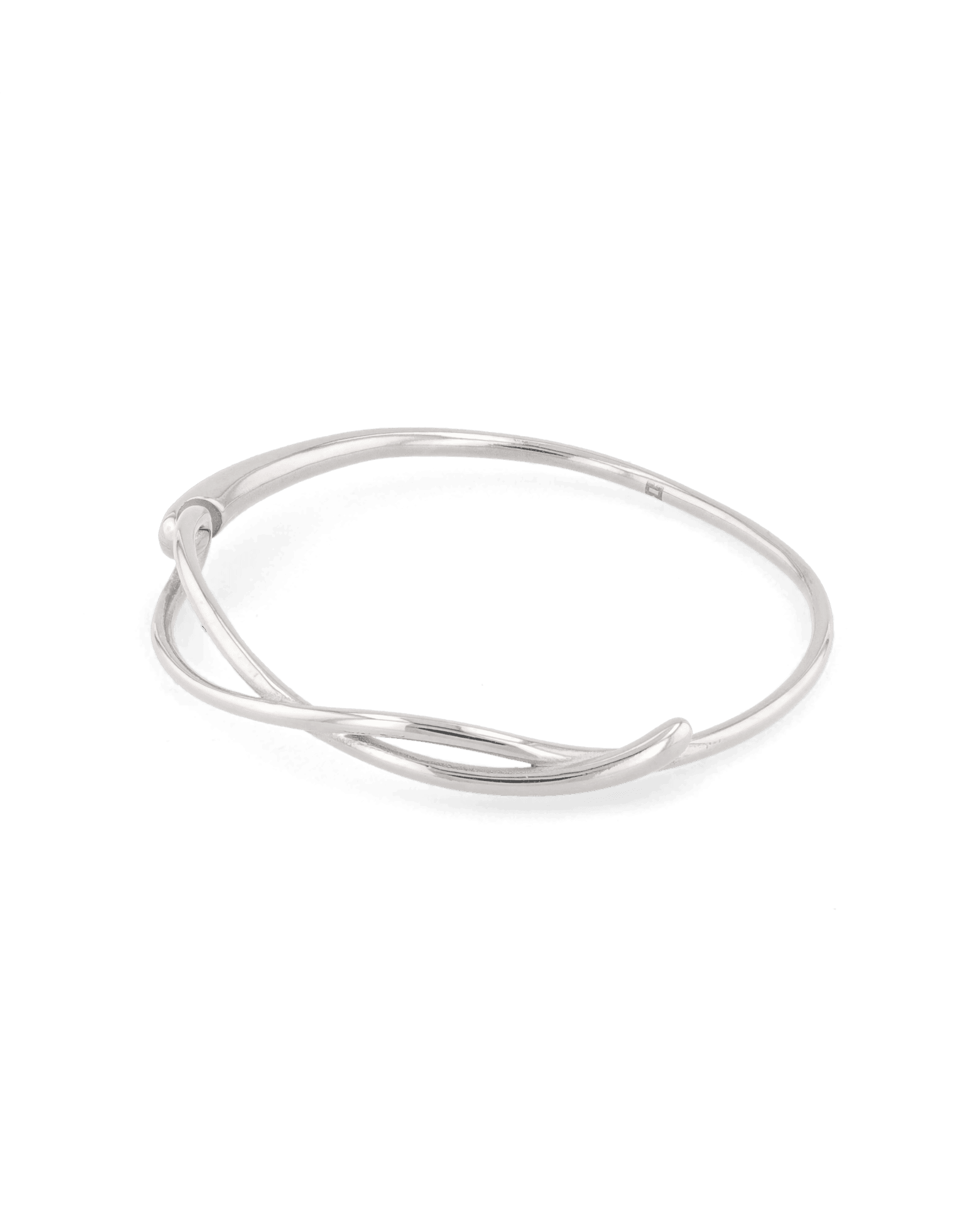 Organic Fluid Silver Bangle with smooth sculptural loop design by Lavana