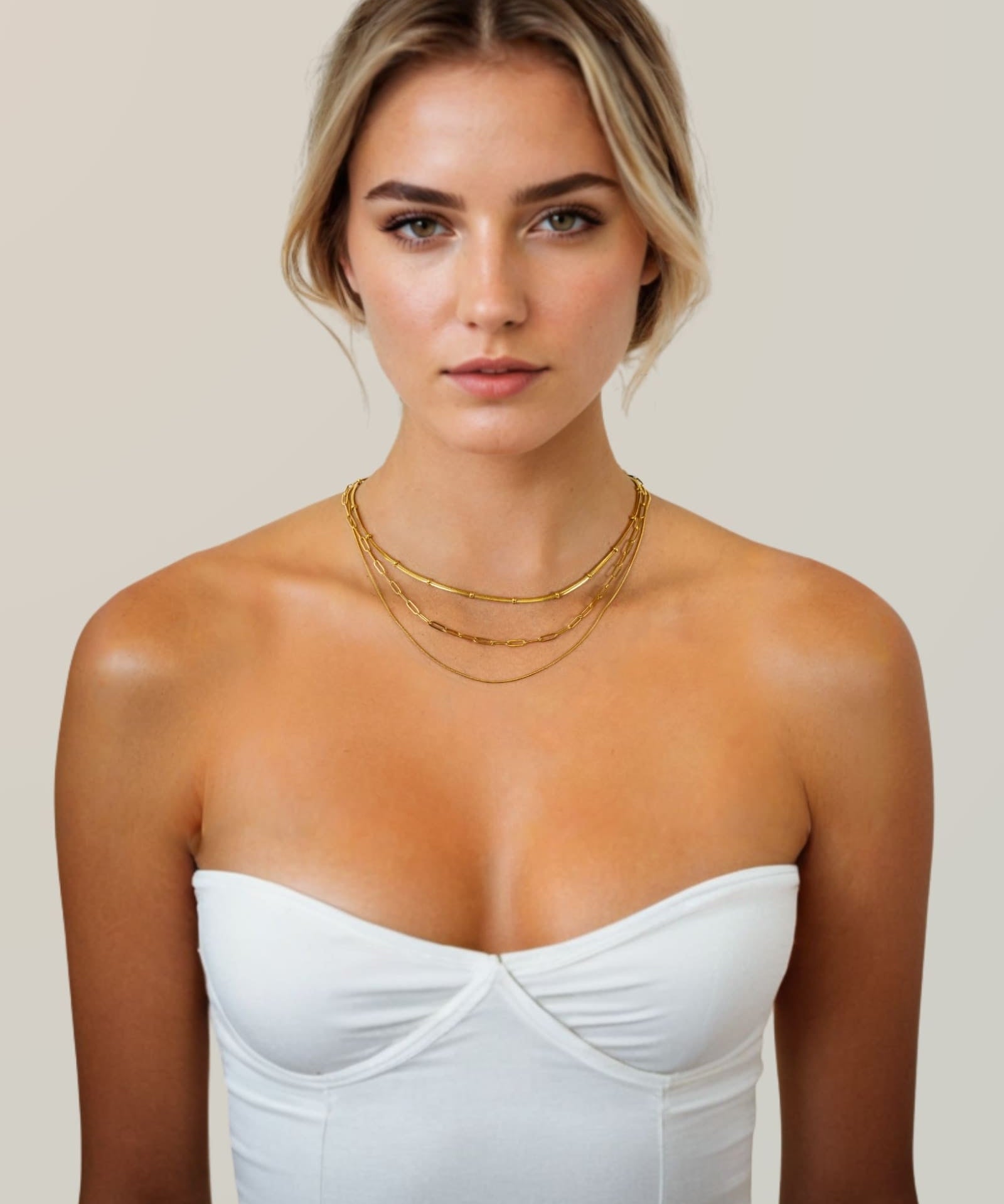 Paperclip Trinity Gold Chain Necklace Set by Lavana; on model; three layered chains with paperclip middle