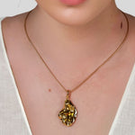 Pearlescent Reversible Gold Pendant by Lavana on model with brushed front and high polish back