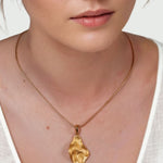Pearlescent Reversible Gold Pendant by Lavana on model with brushed front and high polish back