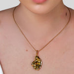 Pearlescent Reversible Gold Pendant by Lavana on model with brushed front and high polish back