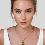 Pearlescent Reversible Gold Pendant by Lavana on model with brushed front and high polish back