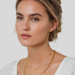 Porto Gold Curb Chain Necklace by Lavana on model chunky polished curb links with smooth drape