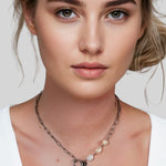 Positano Silver Pearl Necklace by Lavana on model asymmetric paperclip links with baroque pearl drop