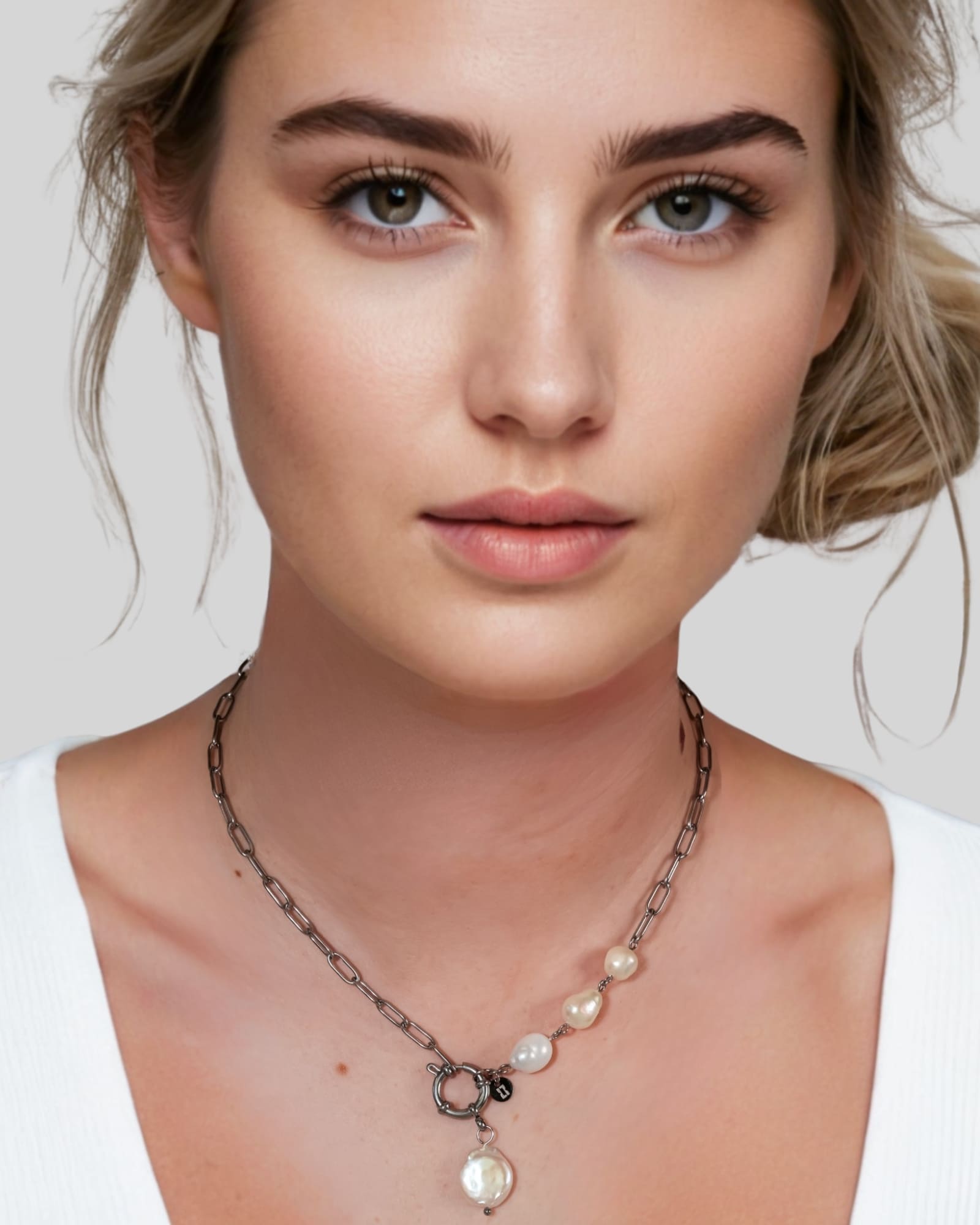 Positano Silver Pearl Necklace by Lavana on model asymmetric paperclip links with baroque pearl drop