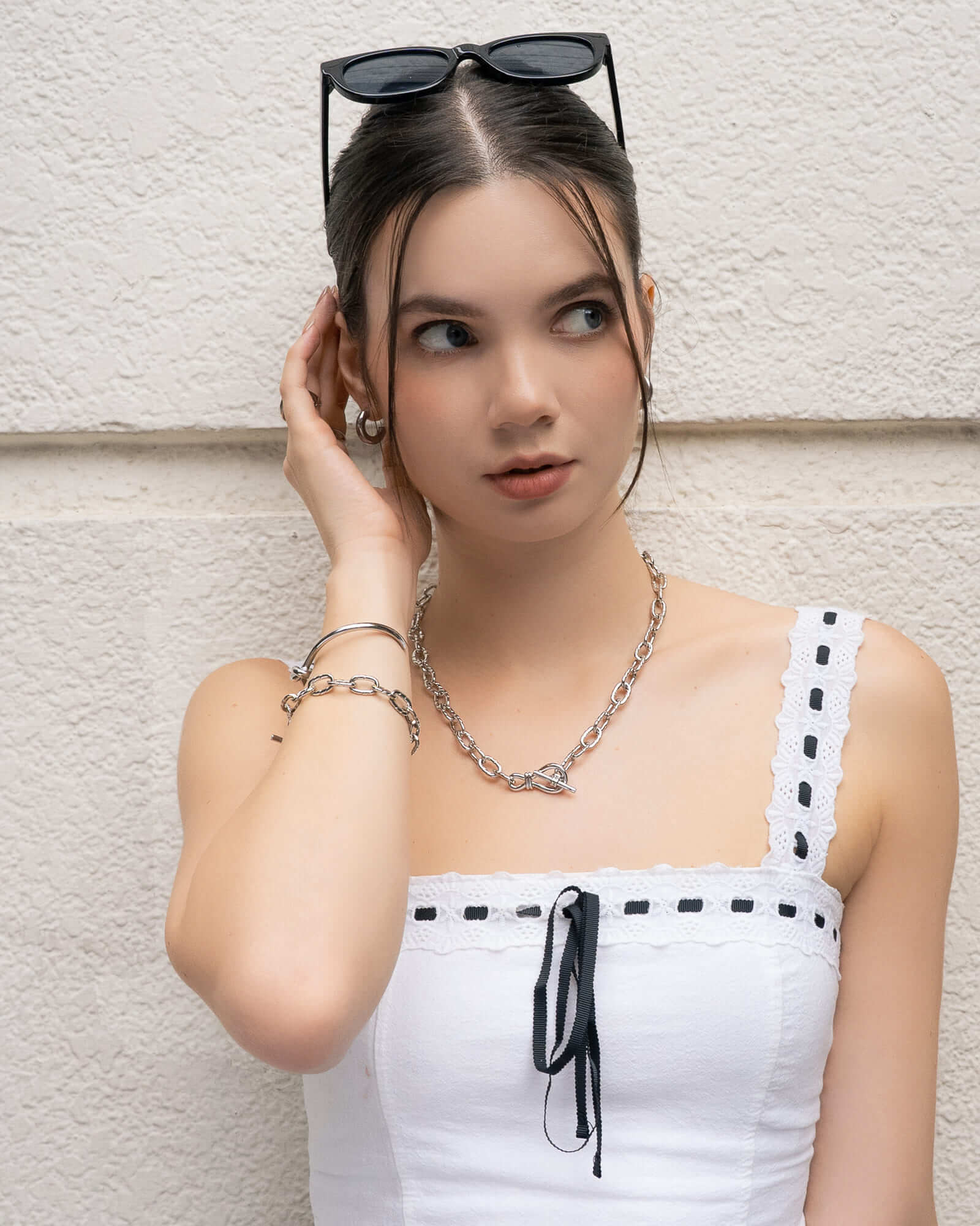 Pretzel Knot Silver Cuff Bracelet by Lavana, on model; with polished knot detail on an open classic cuff