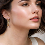 Radiance Gold Hoop Earrings by Lavana on model — lightweight large twisted textured round hoops