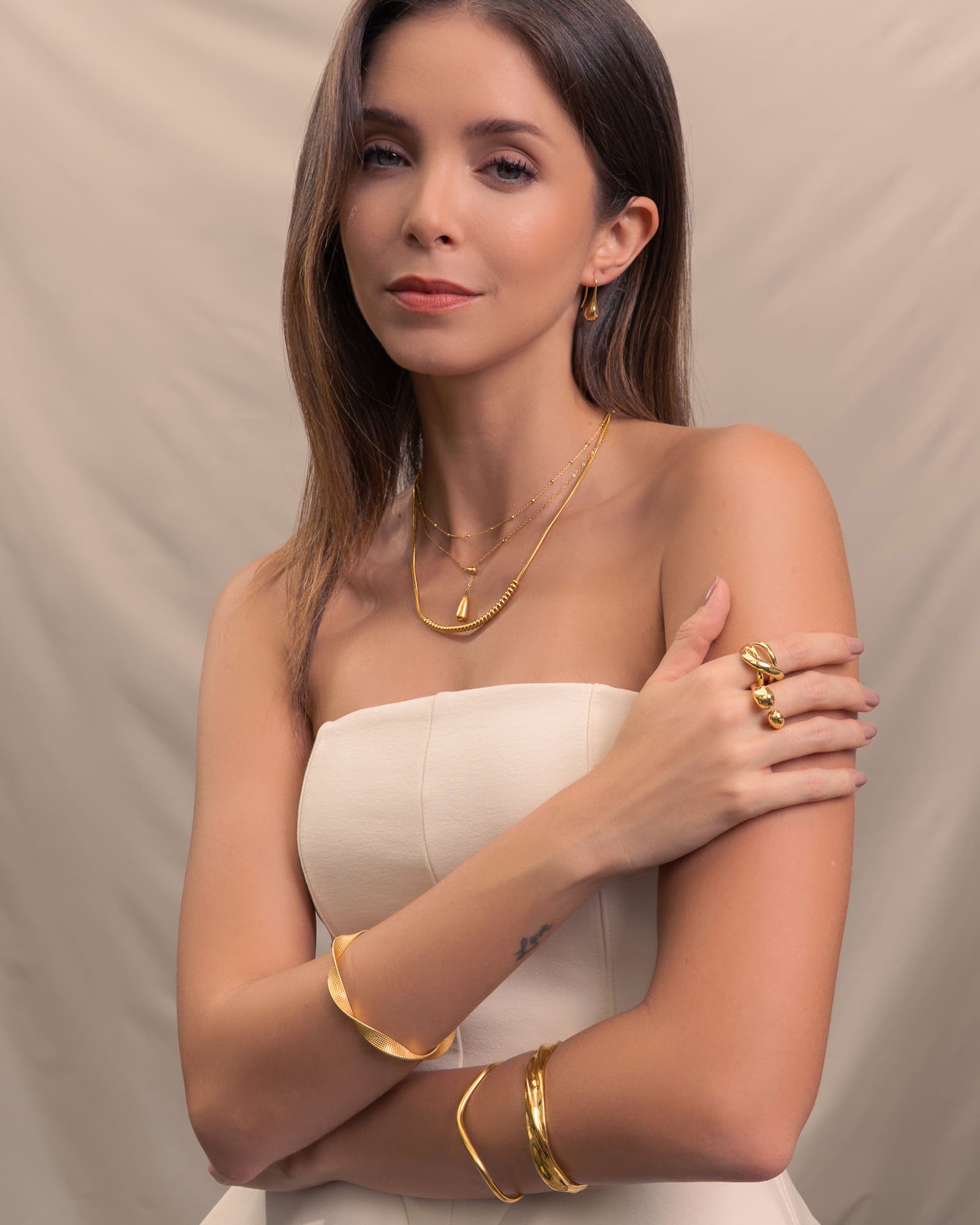 Raindrop Gold Lariat Necklace by Lavana, on model; fine chain with modern polished twin droplet Y-pendant