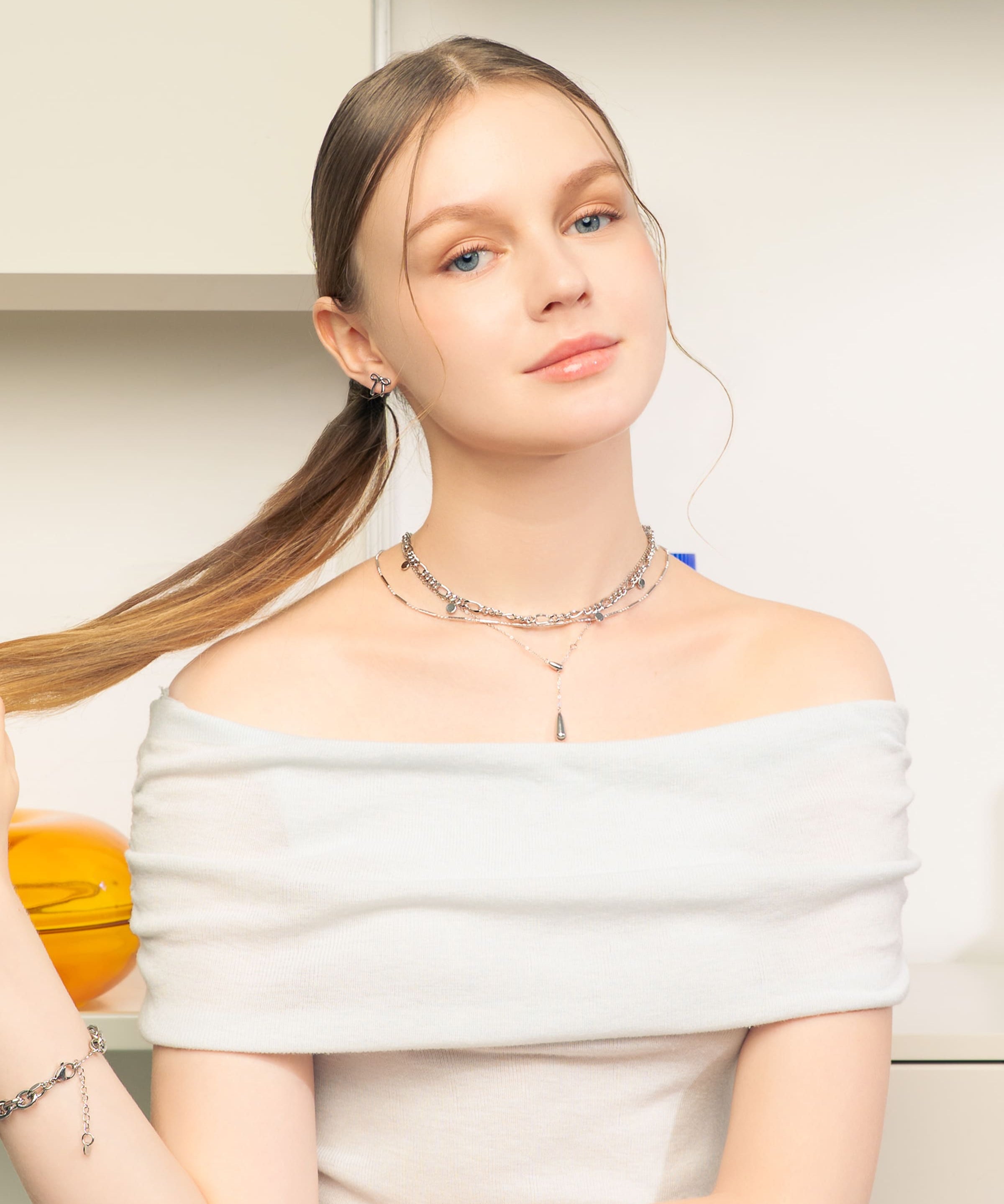 Raindrop Silver Lariat Necklace by Lavana, on model fine chain with polished modern twin droplet Y-pendant