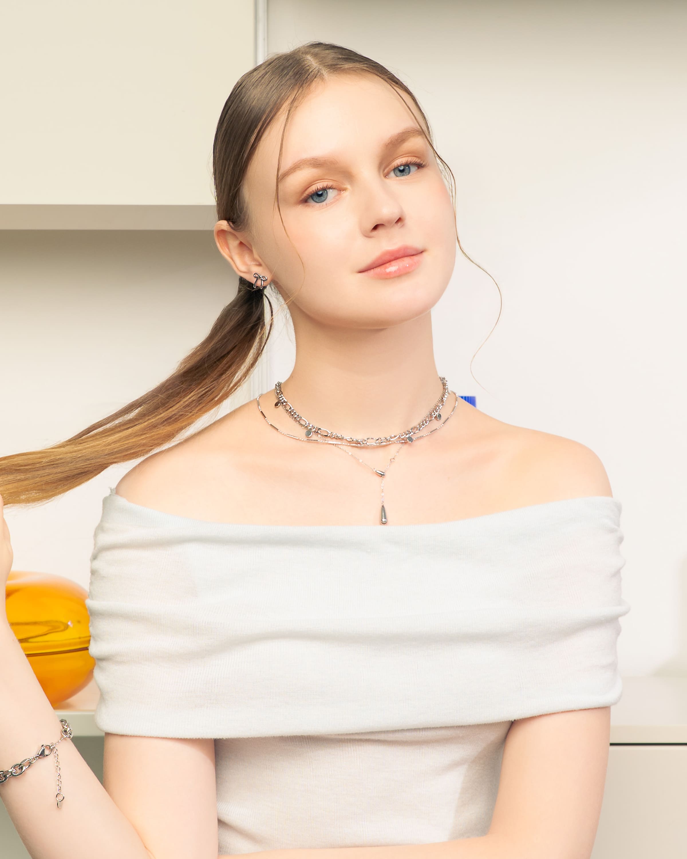 Raindrop Silver Lariat Necklace by Lavana, on model fine chain with polished modern twin droplet Y-pendant