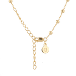 Raleigh Gold Station Chain Necklace by Lavana, with fuller bead stations along a fine chain, clasp