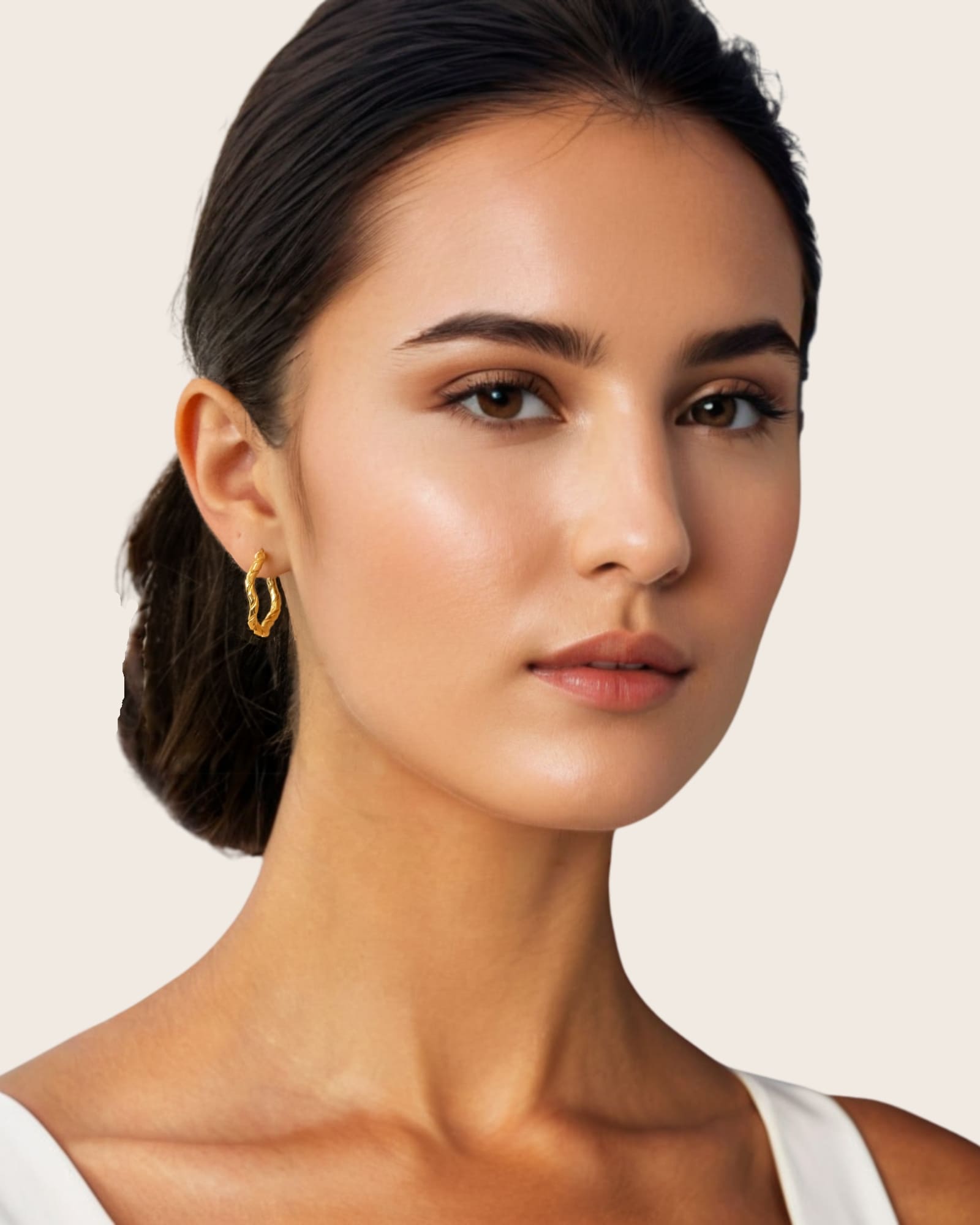 Ripples Gold Hoop Earrings by Lavana, on model; slim round hoops with organic textured ripples