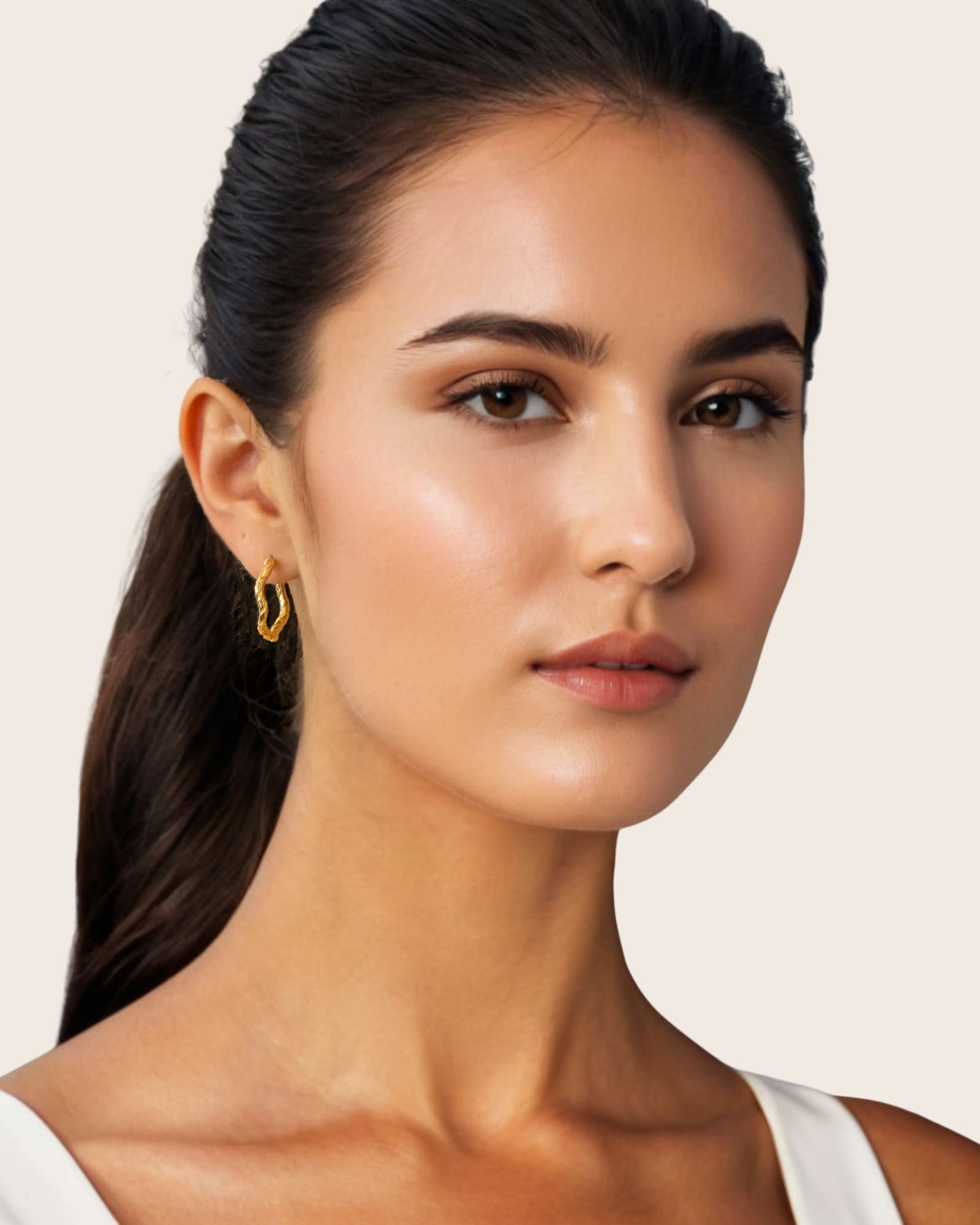 Ripples Gold Hoop Earrings by Lavana, on model; slim round hoops with organic textured ripples