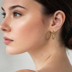 Ripples Gold Hoop Earrings by Lavana on model slim round hoops with organic textured ripples