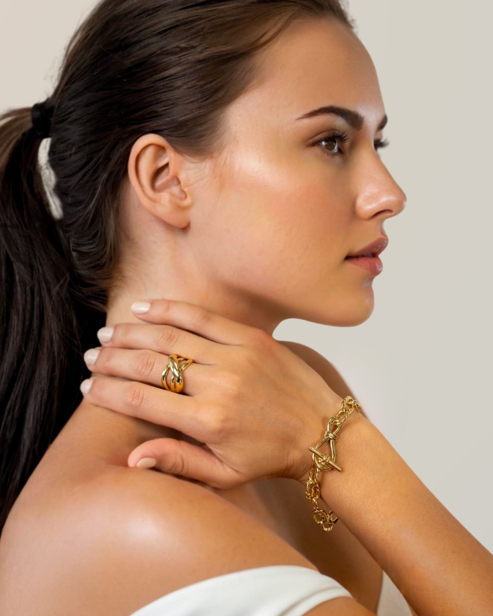 Riviera Gold Textured Link Bracelet by Lavana on model with toggle loop clasp