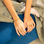 Riviera gold textured link bracelet by Lavana, on model with trendy toggle loop clasp