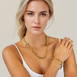 Riviera gold textured link necklace bracelet by Lavana, on model; with toggle loop clasp 