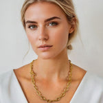 Riviera gold textured link necklace by Lavana, on model; with toggle loop clasp