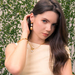 Salina Gold Pearl Bracelet by Lavana, on model; paperclip chain fine chain and floating freshwater pearls
