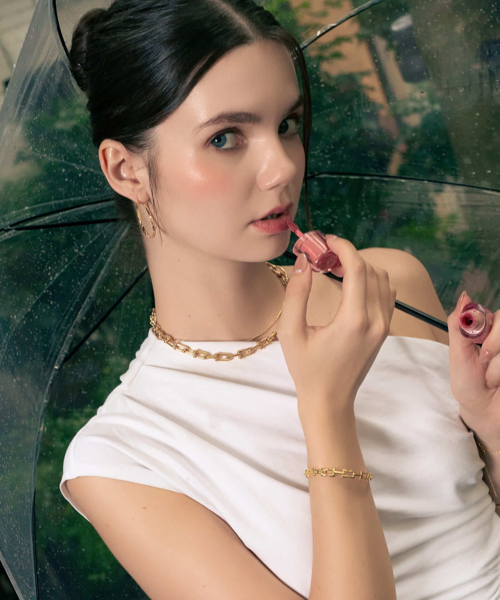 Sculptural Gold Hoop Earrings by LAVANA, on model; round dress hoops with soft sculptural twist X-Large 
