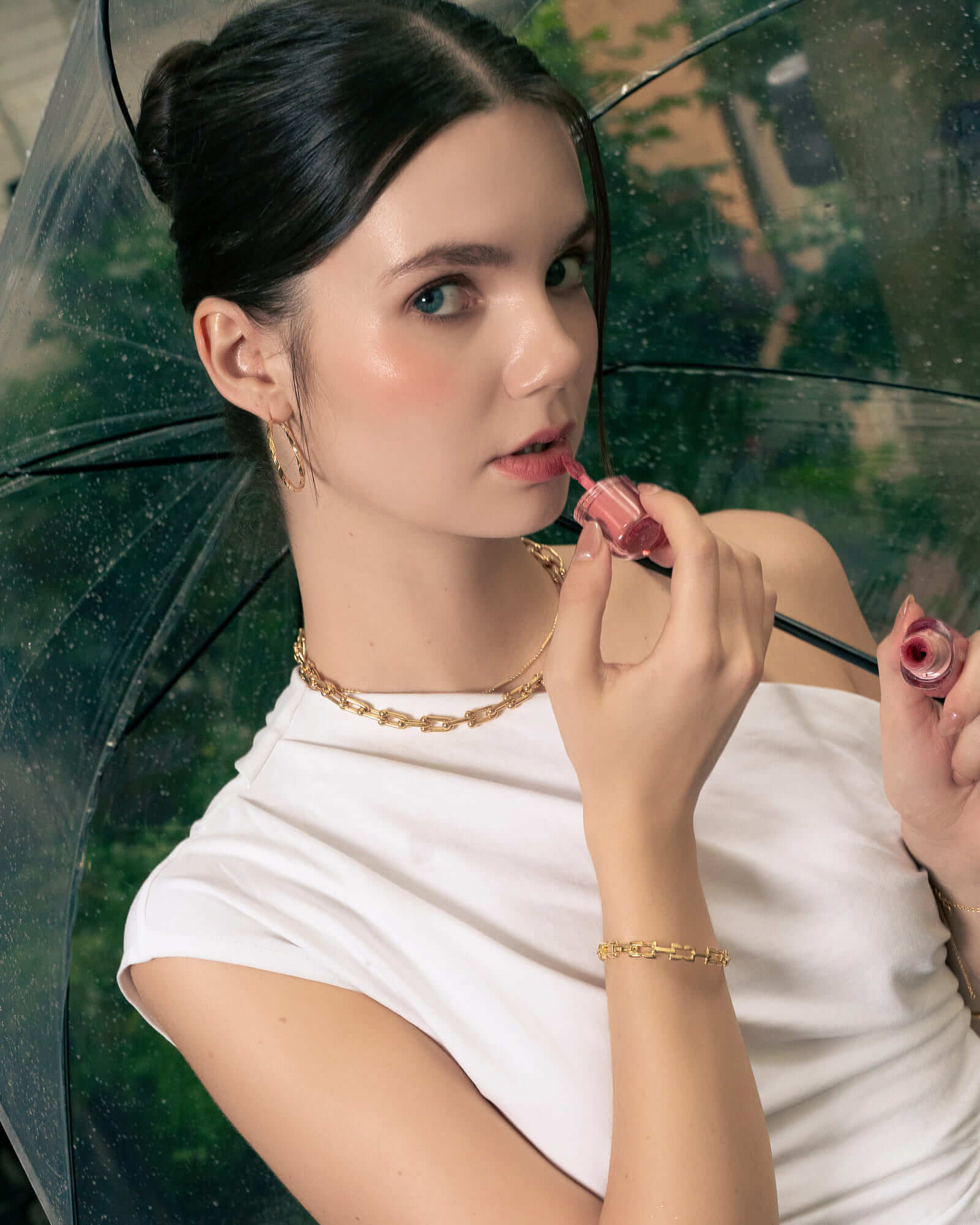 Sculptural Gold Hoop Earrings by LAVANA, on model; round dress hoops with soft sculptural twist X-Large 