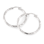 Sculptural Silver Hoop Earrings by Lavana, polished round hoops with gentle sculptural twist