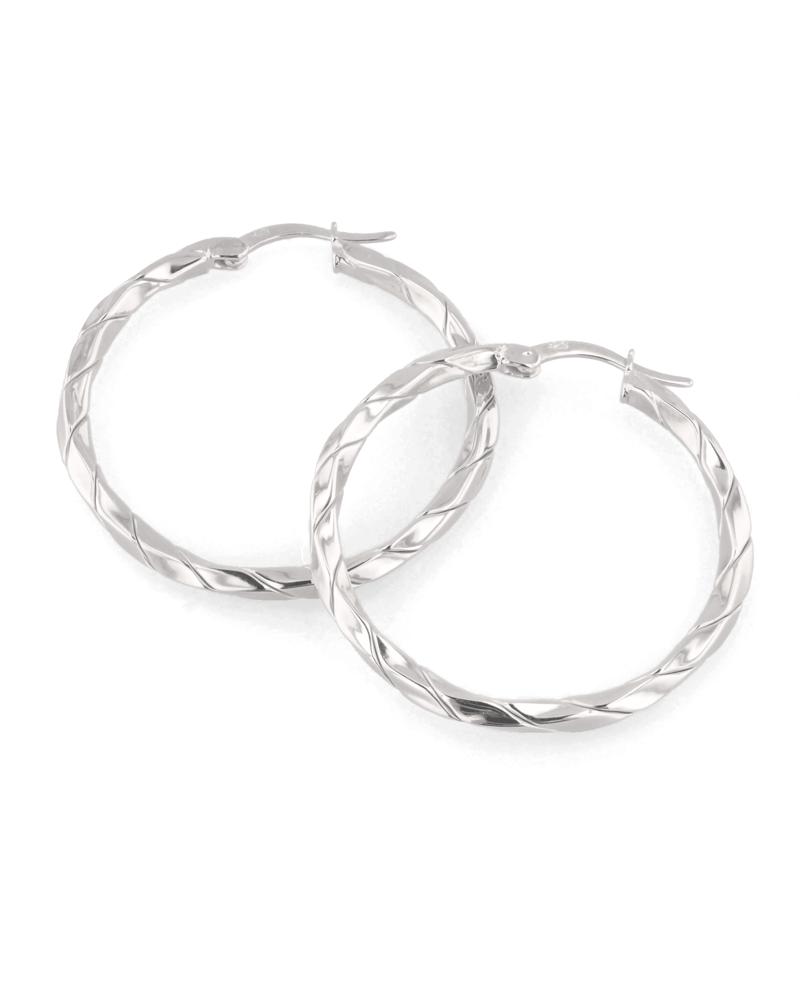 Sculptural Silver Hoop Earrings by Lavana, polished round hoops with gentle sculptural twist