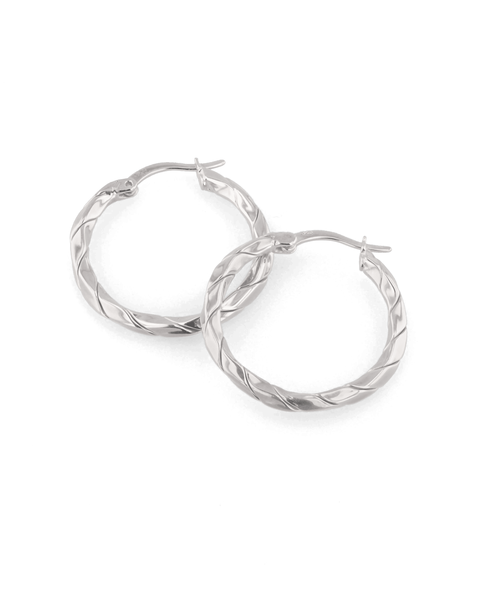 Sculptural Silver Hoop Earrings by Lavana, polished round hoops with gentle sculptural twist