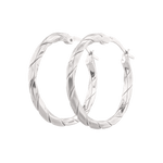 Sculptural Silver Hoop Earrings by Lavana, polished round hoops with gentle sculptural twist