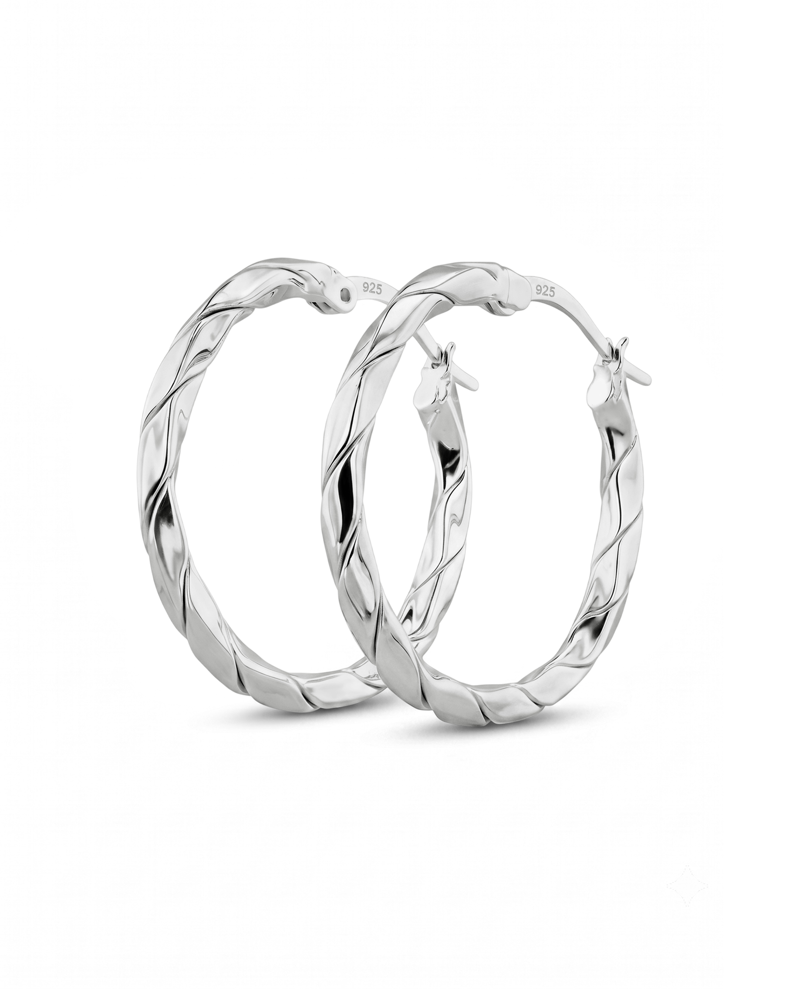 Sculptural Silver Hoop Earrings by Lavana, polished round hoops with gentle sculptural twist