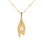 Sea Treasure Gold Pendant by LAVANA Shell inspired pendant with freshwater pearl