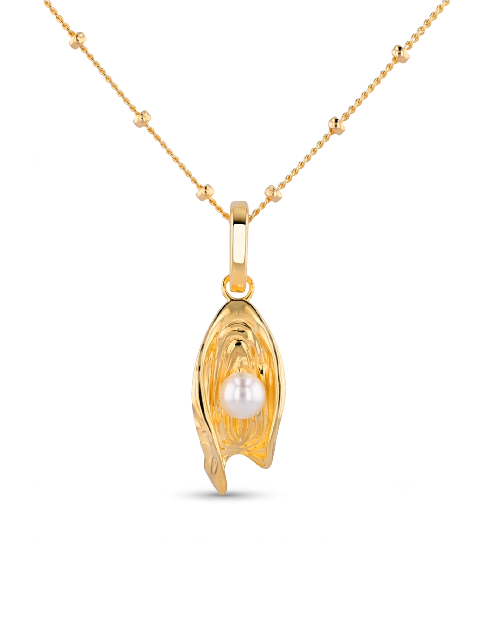 Sea Treasure Gold Pendant by LAVANA Shell inspired pendant with freshwater pearl